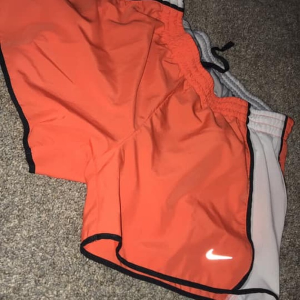 Orange Nike shorts